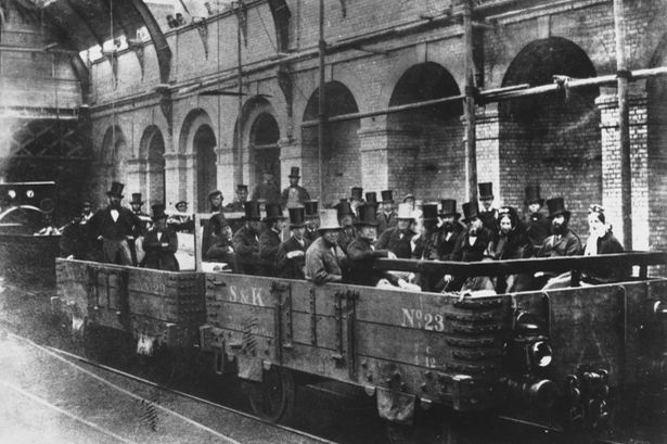 VIPs gaining on a sneak preview of the Metropolitan Railway. 