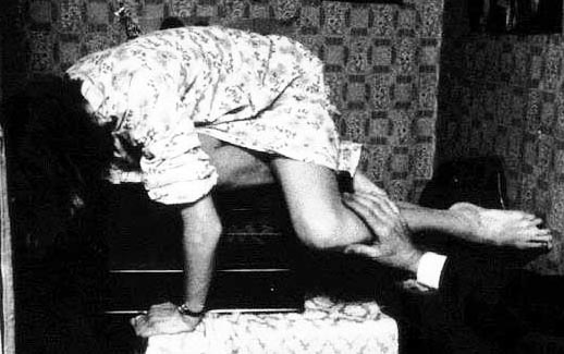 Janet slumped over a cabinet following another supposed levitation. 