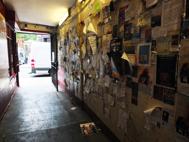 Denmark Place off of Denmark Street... an alley plastered with band adverts and musician requests