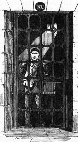 A prisoner in his cell...