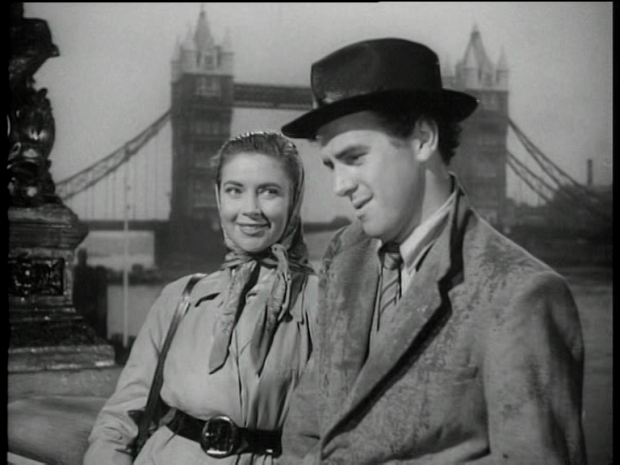 George Cole beside Tower Bridge with Bernadette O'Farrell 