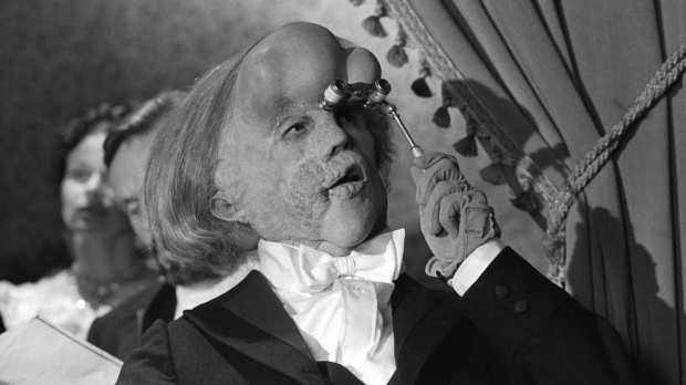 Sir John Hurt as Joseph Merrick